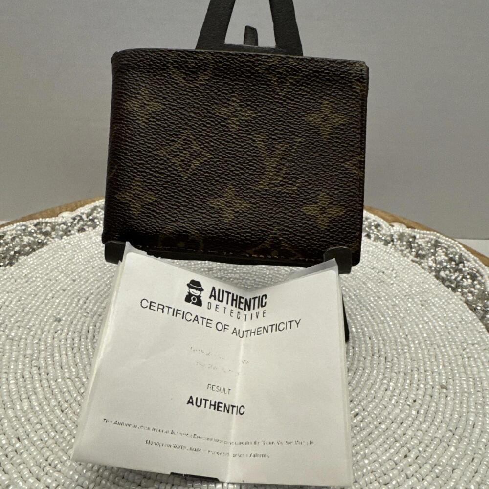 Louis Vuitton Monogram Wallet COA
